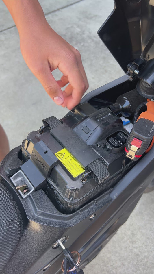 Battery rattle stopper for talaria